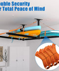 Double Paddleboard And Surfboard Ceiling Storage Rack For Garage Adjustable Overhead Hanger With Straps For Skis Kayaks And Canoes Holds 200 Lbs Black For Quick Setup installed in garage ceiling.
