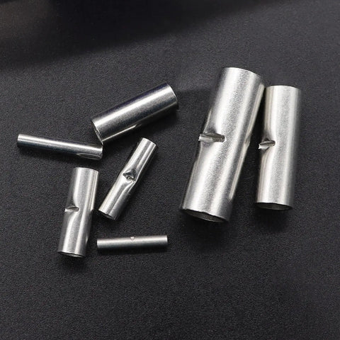 Close-up of tinned red copper butt connectors from 284 Piece Non Insulated Butt Connectors Kit Pro Grade 26 6 Gauge for electrical use.