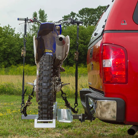 Aluminum Dirt Bike Hitch Carrier With Ramp For 2 Inch Class III IV Receiver attached to red SUV