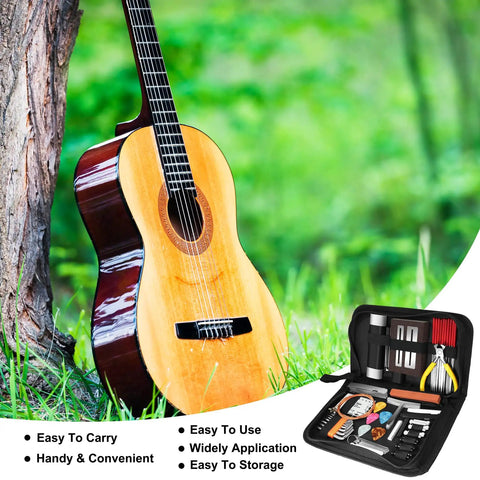 79 Piece Guitar Maintenance Kit with All In One Setup and Repair Tools displayed near acoustic guitar outdoors