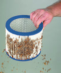 Hand holding HEPA Cartridge Filter For 5 Gallon And Up Wet Dry Shop Vacuums, Built To Last Filtration, Resists Clogging And Keeps Suction Strong.