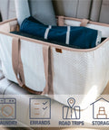 Dope Collapsible Laundry Tote 2-Pack 50L Foldable Carry-All Storage Bin with vegan leather accents on car seat