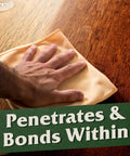 Hand applying Pro Grade 100 Percent Pure Tung Oil Wood Finish that penetrates deep, food safe and waterproof sealer to wooden surface.