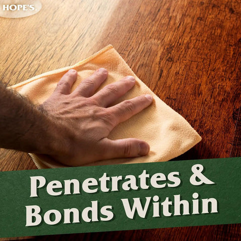 Hand applying Pro Grade 100 Percent Pure Tung Oil Wood Finish that penetrates deep, food safe and waterproof sealer to wooden surface.