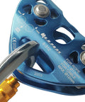 Close-up of a blue 30kN Tandem Speed Double Pulley Zip Line Trolley for Backyard Setups, Heavy Duty Mountaineering Climbing and Rescue Gear