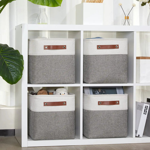 11 Inch Cube Storage Bins Set Of 4 With PU Leather Handles in white and grey on shelf, great for nursery or closet organizers.