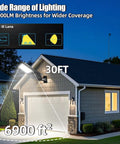 Crazy Bright 300W LED Parking Lot Light With Adjustable Arm Mount illuminating a residential driveway and garage