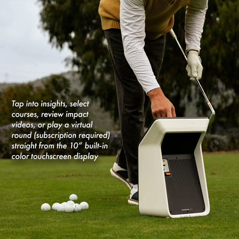 Golfer using Approach R50 Golf Launch Monitor And Simulator Bundle With Three Camera Precision Built In Ten Inch Color Touchscreen