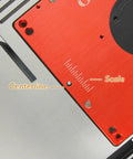 Motorized Router Lift For 3 5 Inch Routers Featuring Digital Controller Micro Adjustment showing red aluminum plate with scale.