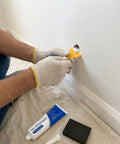 Person using Fast Dry Wall Patch Kit With Scraper For Holes And Cracks White Wall Repair Paste Waterproof Heavy Duty Mending Paste Quick Dry DIY Home Fix