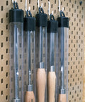 Dope M2 High Speed Steel Woodturning Gouge Built Tough With Deep Cryo Processing For Insane Edge Grip hanging in protective tubes.
