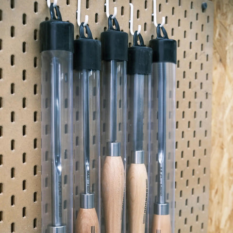 Dope M2 High Speed Steel Woodturning Gouge Built Tough With Deep Cryo Processing For Insane Edge Grip hanging in protective tubes.