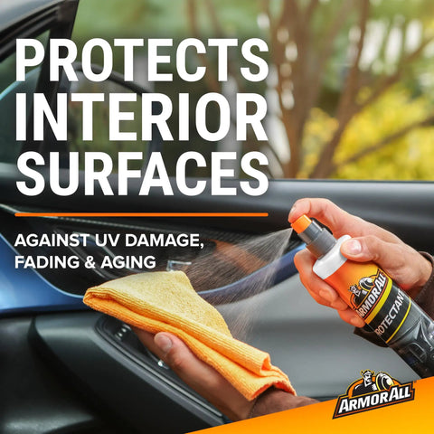 Spraying protectant from All In One Car Cleaning Kit With Wash And Wax Glass Wipes Tire Foam And Protectant on car interior.