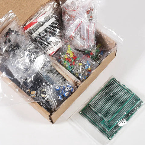 Open box showing Massive 1900 Piece Electronics Component Kit for DIY Projects Featuring LEDs Resistors Capacitors Transistors DC Jacks PCBs
