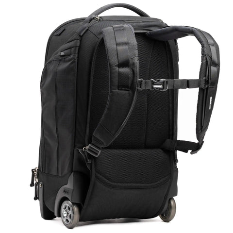 Walker Pro Rolling Camera Backpack with wheels and dual-density shoulder straps, rear view showing durable straps and handle.