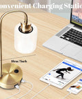 Lit Industrial Brass Table Lamps Set Of 2 With USB Ports For Nightstand And Living Room shown on desk with devices charging