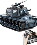 Close-up of 1 18 Scale KV1 RC Tank with smoke, lights, and sound, showing turret details and remote control for realistic battle play