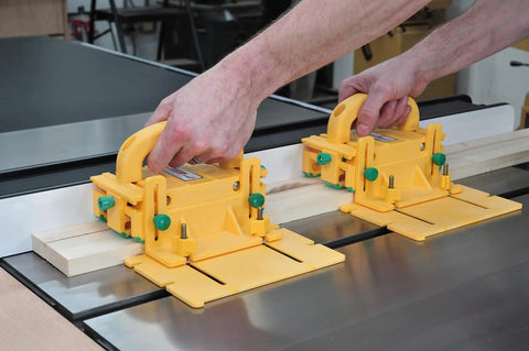 Killer Table Saw 3D Grip Pushblock With Dead Solid Kickback Stopping Guard and Sliding Blade Shield, yellow, stabilizing narrow wood strips.