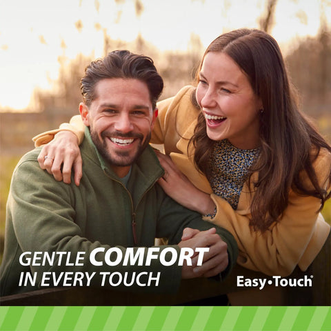 Couple smiling outdoors, Easy Touch logo, gentle comfort in every touch