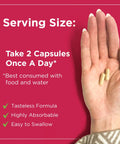 Hand holding two D Mannose Capsules 1000mg With Cranberry Extract Hibiscus And Dandelion for recommended daily use
