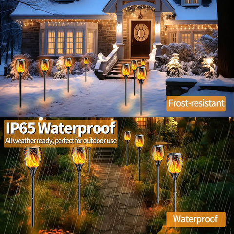 Outdoor Solar Torch Lights With Realistic Flickering Flames Adjustable Height 30.7 To 43 Inches Weatherproof Yard Path Torches Cordless Easy Setup Warm Ambient Glow For Nighttime Entertaining installed along a snowy path and garden walkway.