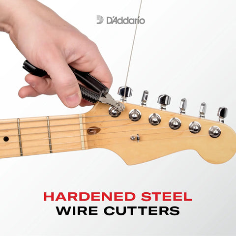 Pro-Winder All-In-One Guitar Tool With String Winder Cutter Bridge Pin Puller in use on guitar strings.