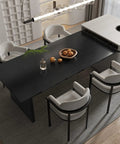 Dining area with elegant chairs and table covered in Black Wood Grain Peel And Stick Wallpaper DIY Friendly 23.6 Inch By 118 Inch Self Adhesive Vinyl Contact Paper For Furniture And Walls Removable Real Wood Texture Durable Easy To Clean With Grid Cut Lines, creating a chic modern look.