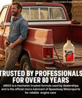 Keep Your Whip Running Slick With This Multifunctional Engine And Fuel Treatment That Dissolves Carbon Buildup Boosts Gas Diesel Power Lubricates Metal Parts For Transmission And Power Steering In A 32 Oz Bottle on a red truck with a man in denim.