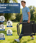 Man carrying Zero Gravity Lounge Chairs Set Of 2 With Pillow And Cup Holder Tray Adjustable Folding Outdoor Camping Reclining Chairs
