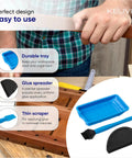 Built Different Non Stick Silicone Glue Brush Set With Tray And Spreader Tool Smooth Operator tools on a workbench, showing tray and applicators.