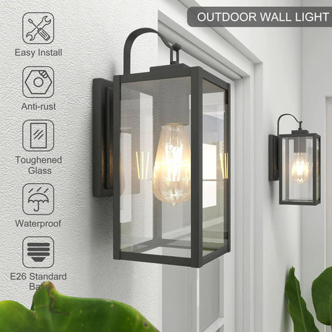 Lit Matte Black Outdoor Wall Lights Pack of 2 with Clear Glass Shade Waterproof Front Porch Sconces on white exterior wall