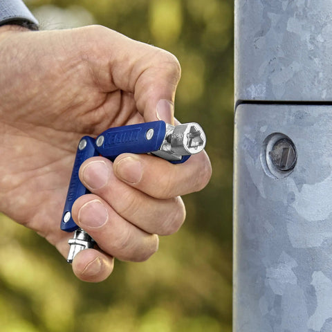 Hand holding Double Joint Folding Cabinet Key With Magnetic Locking Three Profiles Outside Square Triangle And Double Bit