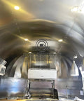 Interior view of Built Different Stainless Steel Food Truck With Fully Loaded Commercial Kitchen featuring sleek stainless steel design.