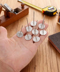 Hella Durable 15 Piece Long Upholstery Nail Set Packed With Heavy Duty Iron Flat Head Push Pins And A Slick Silver Finish on hand.