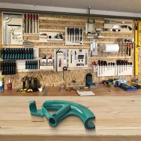 Manual Steel Pipe Bender For 3/4 Inch Copper Tube Conduit Bending Tool Head displayed on a wooden workbench with tools.