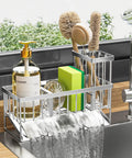 Kitchen Sink Caddy With Automatic Drainage, 304 Stainless Steel Rustproof Sponge Holder, High Brush Holder And Divider, in use