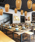 Dining area with multiple Hand Woven Bamboo Rattan Pendant Lights With Natural Finish, Double Layer Dome Shade For A Cozy Boho Vibe