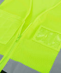 Close-up of breathable lime mesh material and zip front of Stay Dead Visible On The Job With This Class 2 Hi Vis Safety Vest Breathable Lime Black Mesh Work Gear Zip Front Radio Mic Tab Reflective Strips Built Solid For Road Crews Large Xl.