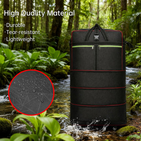Foldable large rolling duffel bag, black waterproof luggage with wheels and handle, green zipper accents.
