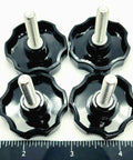 Rock Solid Quarter Inch Twenty Eight Fine Thread Clamping Thumb Screws With Slick Black Knurled Grip And Hex Head Made From Hella Tough 304 Stainless Steel For Zero Hassle Quick Adjust No Wrench Needed Everyday Use Four Pack Hardware - close-up view of four thumb screws with knurled grips.