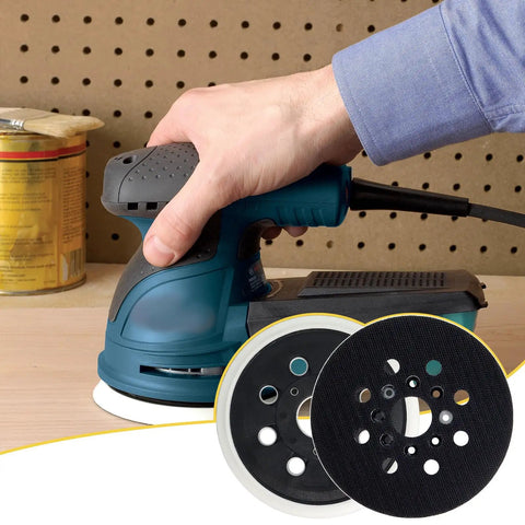 Hand using a random orbit sander with 5 Inch 8 Hole Hook And Loop Replacement Sander Pad For Random Orbit Sanders 5 Inch Backing Pad.