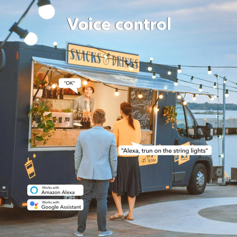 Outdoor Smart WiFi Plug Outlet With Heavy Duty Grounded Outlet No Fuss Remote App Control And Voice Control Works With Alexa And Google Home 2.4 GHz WiFi Only ETL Listed 1 Pack displayed at a food truck with string lights.