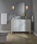 Modern bathroom with Grand Towel Ring In Vibrant Brushed Nickel, showing transitional style and cohesive design with faucets.