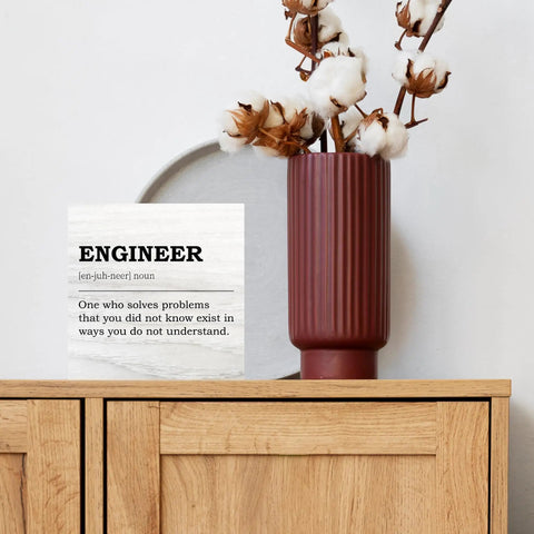 Engineer Definition Decor Box Sign For Office And Home Nerdy Wooden Gift For Civil Software Mechanical Electrical Engineers Great Desk Decor For Coworkers Friends And Family Rustic 5x5 Inches displayed on a wooden shelf next to a tall vase.