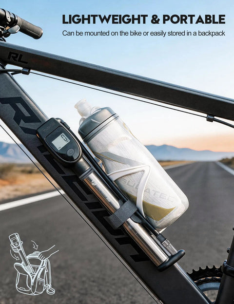 320 PSI High Pressure Bike Shock Pump with gauge mounted on a bike frame beside a water bottle, visible on an open road