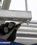 Rugged 1 Inch Diameter 18 Inch Length All Thread Rod Kit 2 Pack being installed with wrench on galvanized steel structure