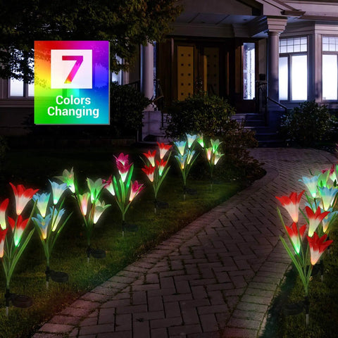 Solar Lily Garden Lights 6 Pack With 24 LED Outdoor Stake Lights Waterproof Color Changing Flower Pathway Lights glowing along a walkway