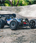 ARRMA Typhon 1 Eight Scale RC Buggy Ready To Race 6S 4WD BLX RTR With TLR Tuned Parts And Spektrum Electronics on dirt track