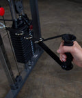 Top Shelf Dual Stack Cable Crossover Machine For Home And Commercial Gyms Featuring Professional Functional Training Rig with grip handle and weights.