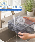 1.8L Water Container being filled at sink, featuring a detachable structure for easy refilling and convenience.